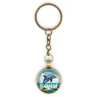 Круглый брелок, цвет бронза, с цепочкой, Дельфин C0115018