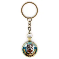 Круглый брелок, цвет бронза, с цепочкой, Янтарь Зеленоградска C0207018