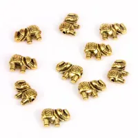 Бусина металлическая 1 шт. Слон 12х8мм, отверстие 1мм, цвет золот. FBM1006G