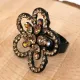 Безразмерное кольцо Цветок со стразами, цвет черный UC141-B
