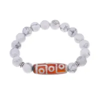 Браслет с 9-глазой бусиной Дзи и нат.камнем Кахолонг BSDS-27-07
